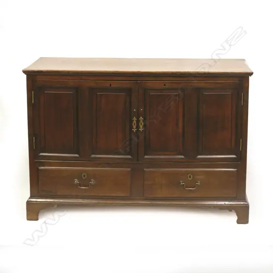 A Georgian oak sideboard