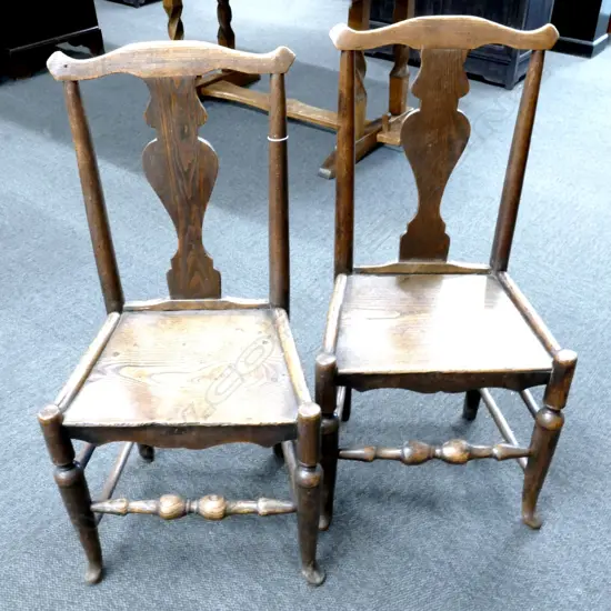 A pair of Georgian elm country single chairs