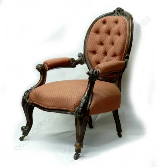 A Victorian mahogany open elbow armchair