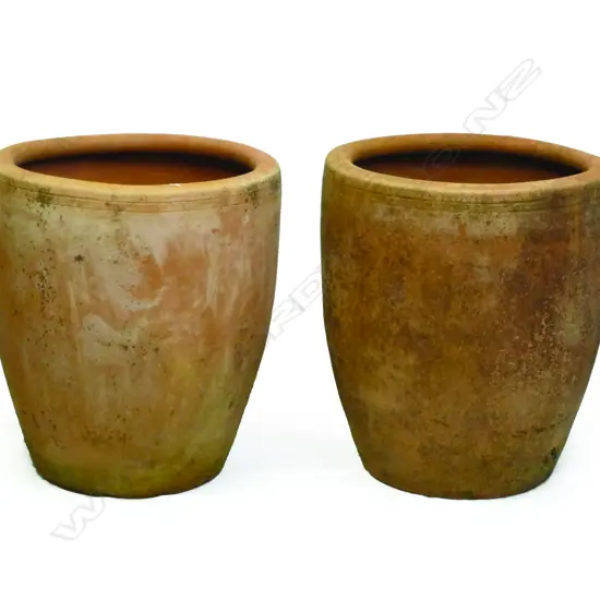 A pair of vintage terracotta garden pots
