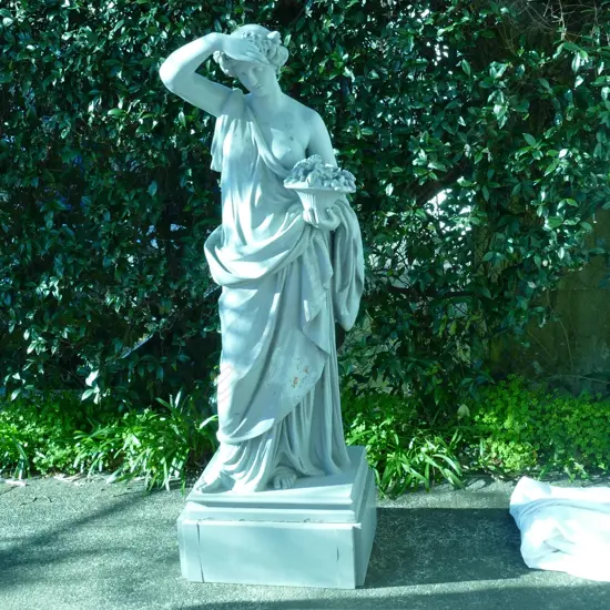 A vintage metal garden statue
