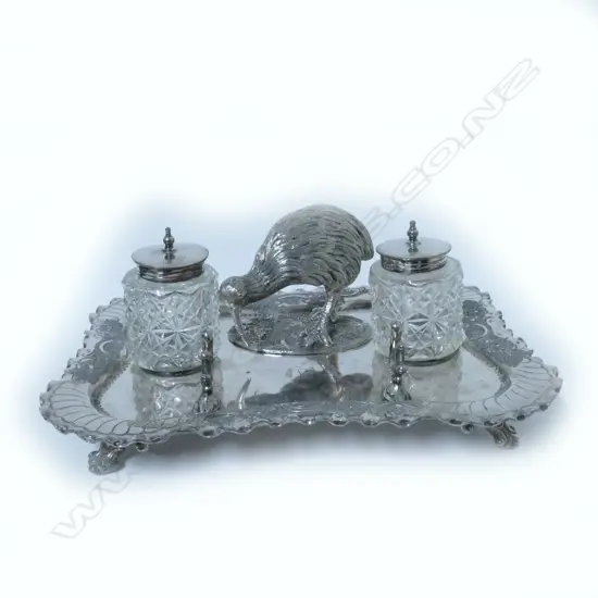 A New Zealand themed silver plated desk set