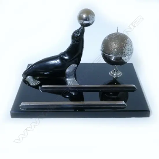 An Art Deco performing seal themed desk set