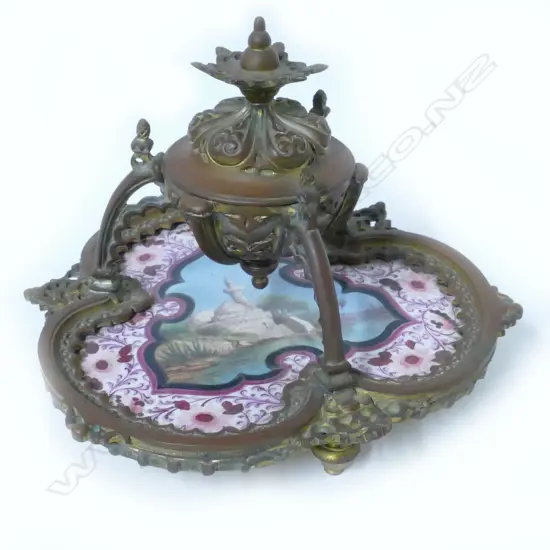 An Egyptian Revival gilt brass inkwell in the French manner