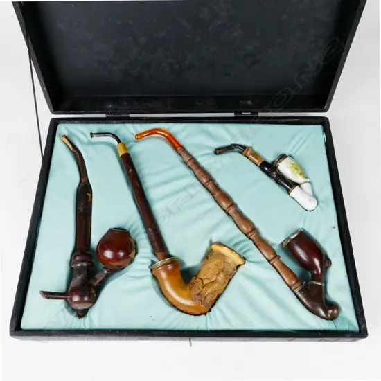 Four boxed German pipes