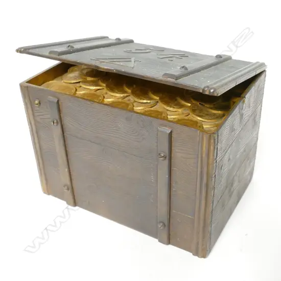 A cast metal box in the form of a wooden iron bound chest