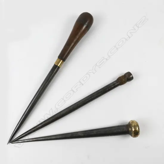 Three old sailor's marlin spikes