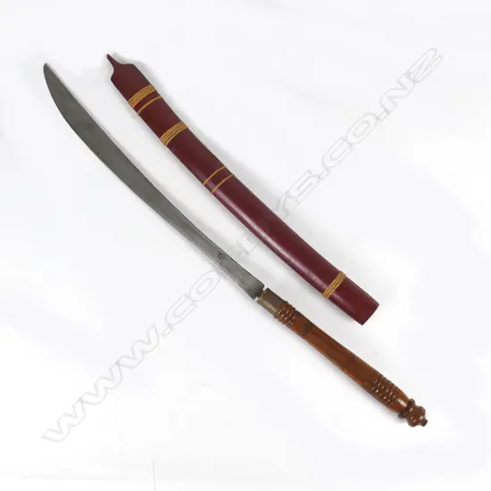 A vintage Burmese dha sword
