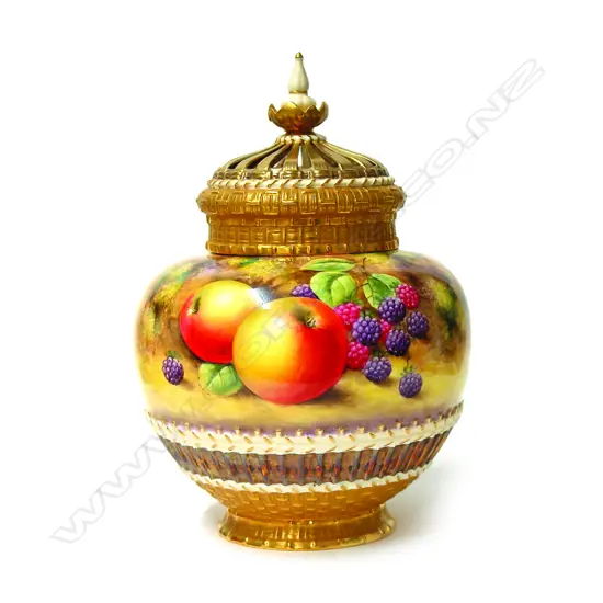 An early 1970s Royal Worcester large potpourri vase painted with fruit