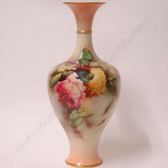 An early 20thC Royal Worcester baluster rose painted vase