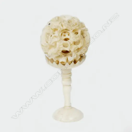 An old Chinese carved ivory small puzzle ball