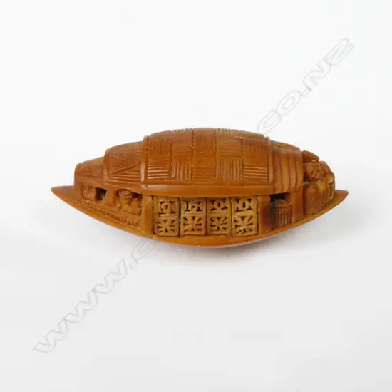 A Chinese carved peach pip