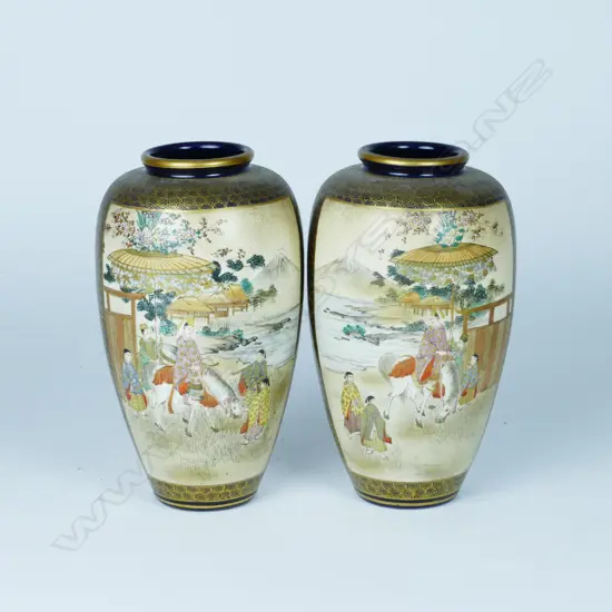A pair of Satsuma earthenware vases