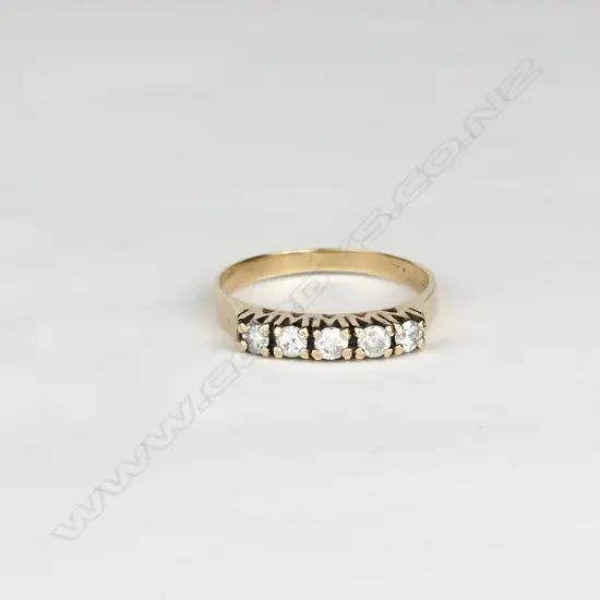 A 9ct gold and five stone diamond ring