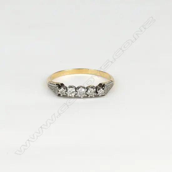 An estate 18ct gold and five stone diamond ring