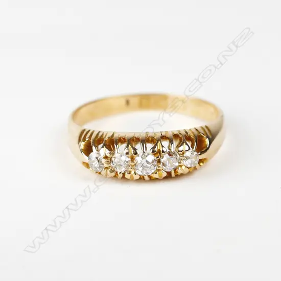 An estate 18ct. yellow gold and diamond bridge ring