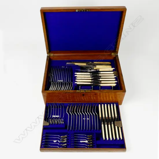 An oak cased canteen of sterling silver cutlery
