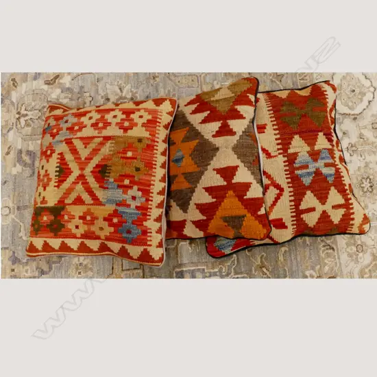 Three kilim cushions