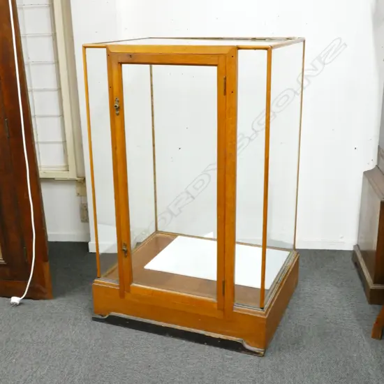 A 1920/1930s oak framed and glazed shop display cabinet