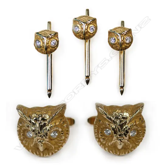 A pair of 14ct gold and diamond owl head cufflinks,