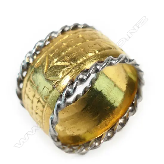 An 18ct gold wide band,