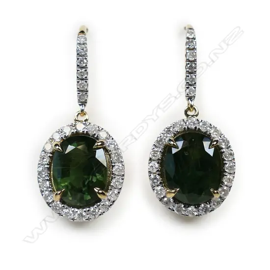 A pair of 14ct gold green sapphire and diamond halo earrings,