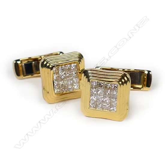 A pair of 18ct yellow gold and diamond set cufflinks,