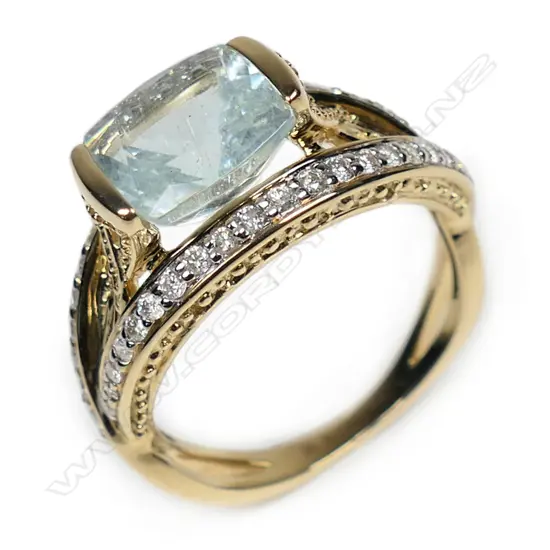 A 14ct gold aquamarine and diamond cocktail ring,