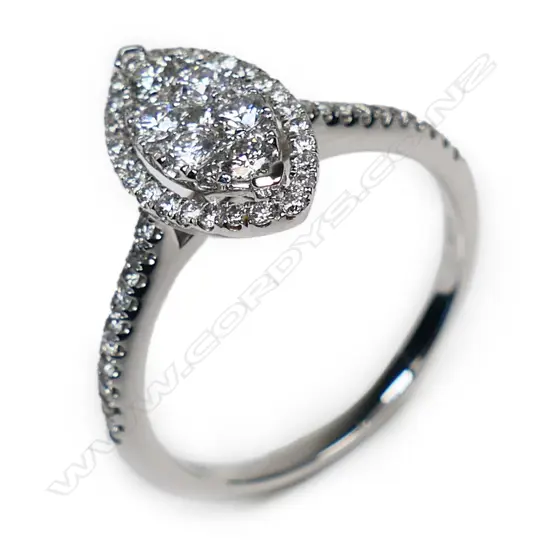 An 18ct white gold and diamond cluster ring,