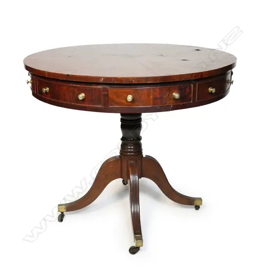 An uncommon Regency mahogany drum table,