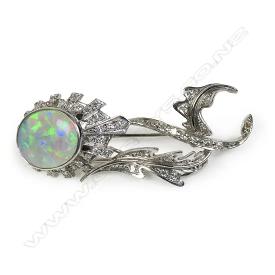 A vintage designer 18ct white gold diamond and opal brooch,