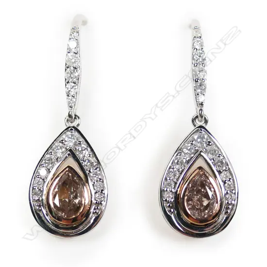 A pair of 14ct white and rose gold diamond drop earrings,