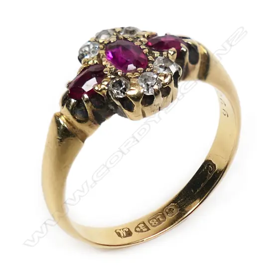 An early 20thC 18ct gold ruby and diamond cluster ring,