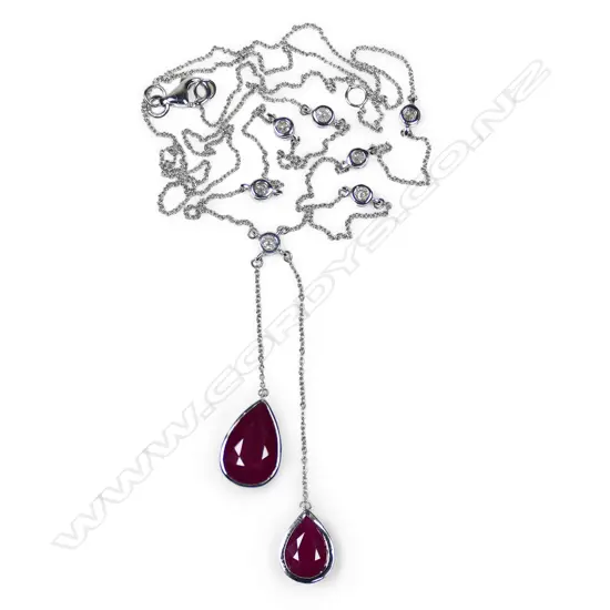 A 14ct white gold ruby and diamond necklace,