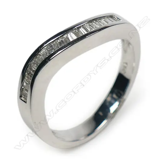 An 18ct white gold and diamond undulating band ring,