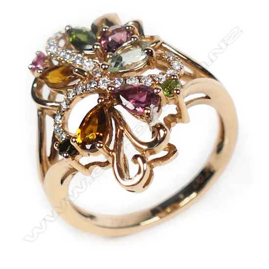 An 18ct rose gold and multi tourmaline and diamond designer ring,