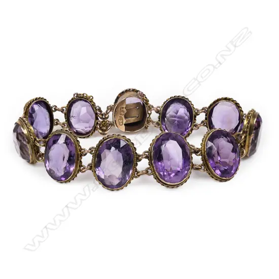 An early 1900s 9ct gold and amethyst bracelet,
