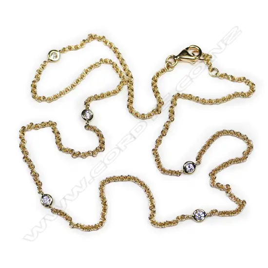 An 18ct gold and diamond set chain necklace,