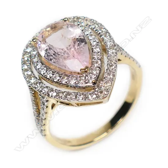 A 14ct gold morganite and diamond double halo ring,