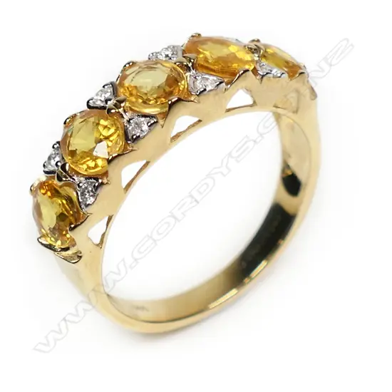 A 14ct gold yellow sapphire and diamond ring,
