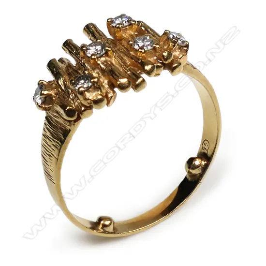 A 1960's/70's 9ct and diamond set designer ring,