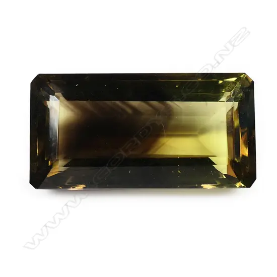 A 24.63ct bi-colour lemon quartz unset gemstone,