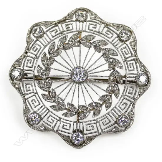 An early 20thC platinum and diamond belle époque brooch / pendant,