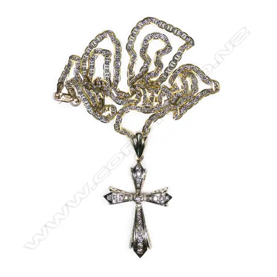 A 14ct gold and diamond cross pendant,