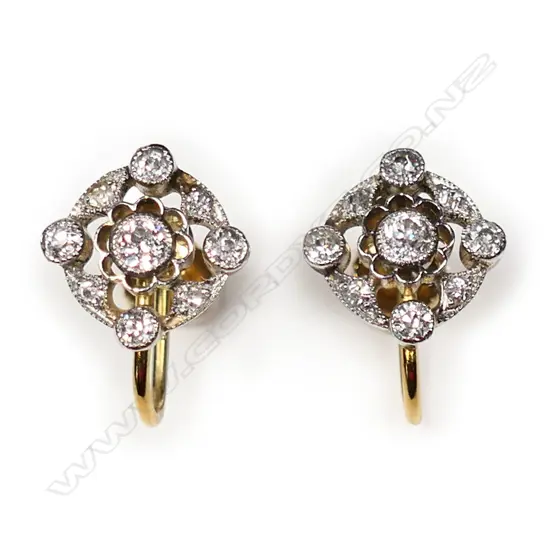 A pair of 18ct white fronted yellow gold and diamond cluster earrings,