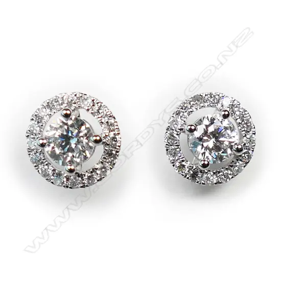 A pair of 18ct diamond stud earrings,