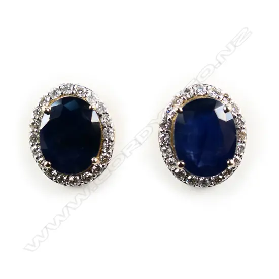 A pair of 14ct gold sapphire and diamond halo stud earrings,