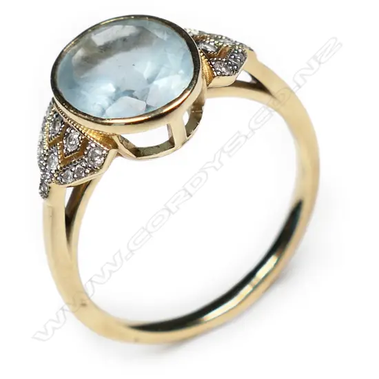 A 14ct gold aquamarine and diamond ring,