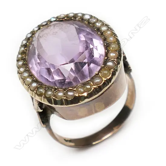 A vintage 9ct rose gold and large amethyst and seed pearl ring,