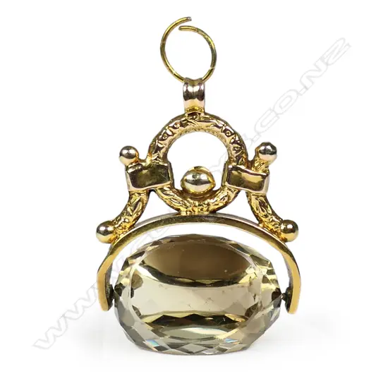 A 19thC 9ct yellow gold and citrine fob spinner,
